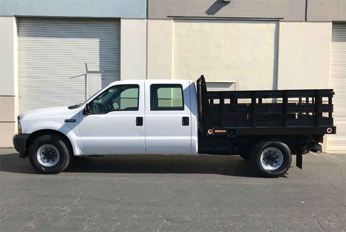 2003 Ford F-350 Crew Cab Stakebed - Driver Side