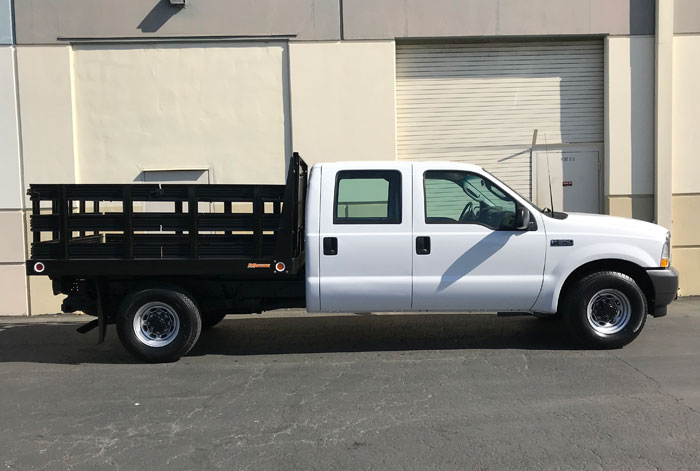 2003 Ford F-350 Crew Cab Stakebed - Passenger Side