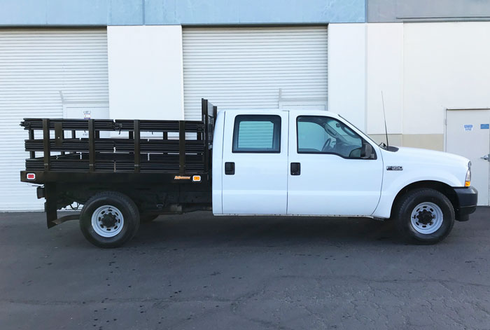 2003 Ford F-350 Crew Cab Stakebed - Passenger Side