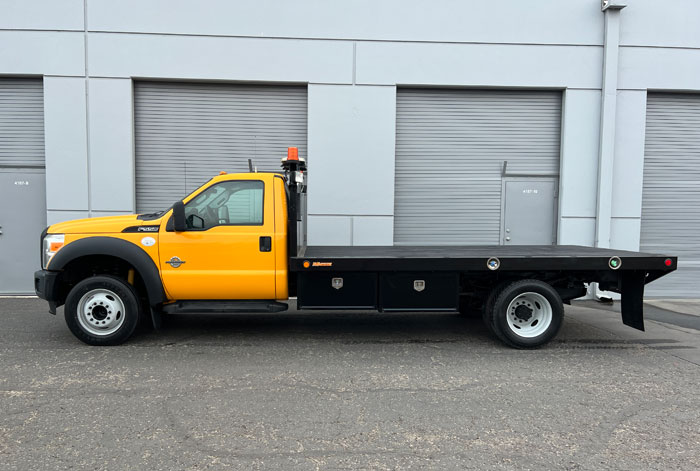 2012 Ford F-550 14' Diesel Flatbed Truck - Driver Side