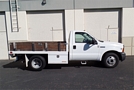 2005 Ford F-350 Xl Stakebed Truck- Passenger Side