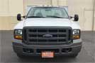 2005 Ford F-350   6 Spd MT. Stakebed - Front View