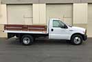 2005 Ford F-350   6 Spd MT. Stakebed - Passenger Side