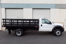 2006 Ford F-450 12 Stakebed Truck - Passenger Side